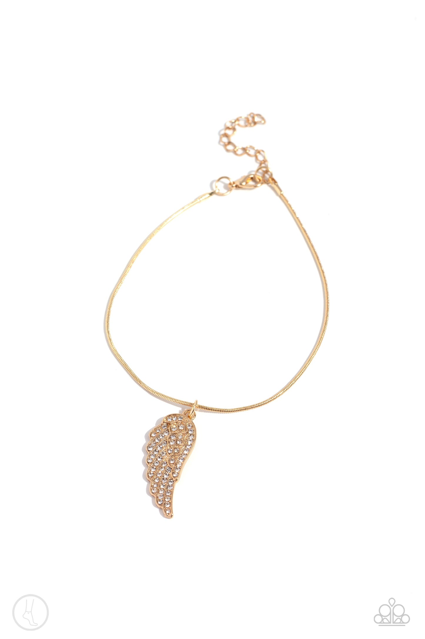 Angelic Accent - Gold Wing Chain Anklet - Paparazzi Accessories - An angelic gold half-wing pendant delicately wraps around the ankle on a gold snake chain. Rows of dainty white rhinestones adorn the winged accents, adding a celestial shimmer to the angelic centerpiece.