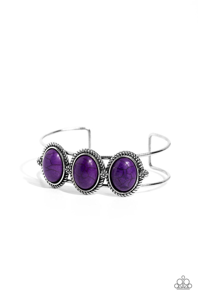 Badlands Backdrop - Purple Bracelet - Paparazzi Accessories - A trio of purple stones, pressed into twisted and textured silver frames graces the top of an airy silver cuff. Dainty floral details separate each stony frame, adding a floral finish to the design.