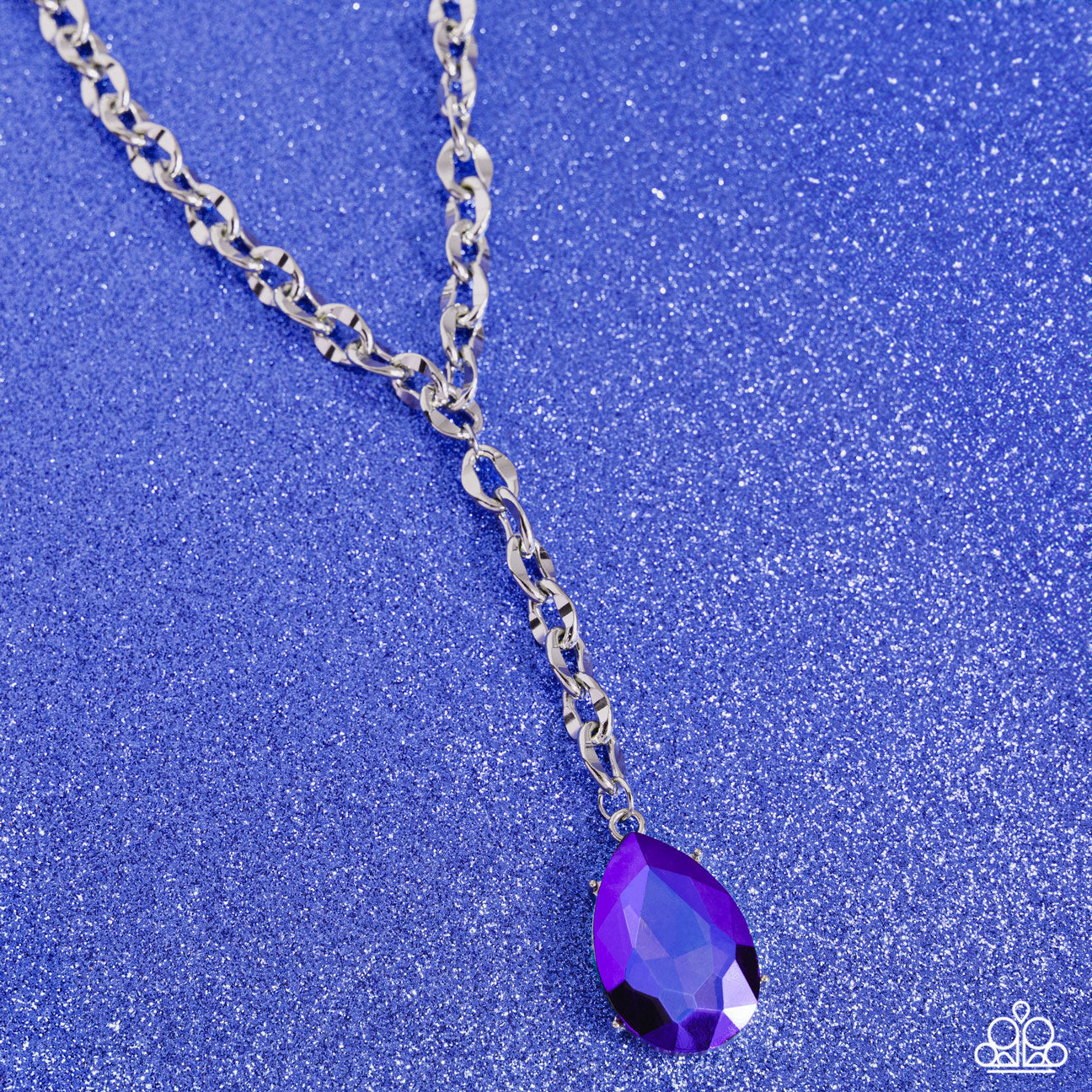 Benevolent Bling - Purple Gem Necklace - Paparazzi Accessories - Set in an elevated silver-pronged frame, a faceted purple UV teardrop gem cascades from an oblong, abstract silver ring chain that extends past the collar for a blinding statement.