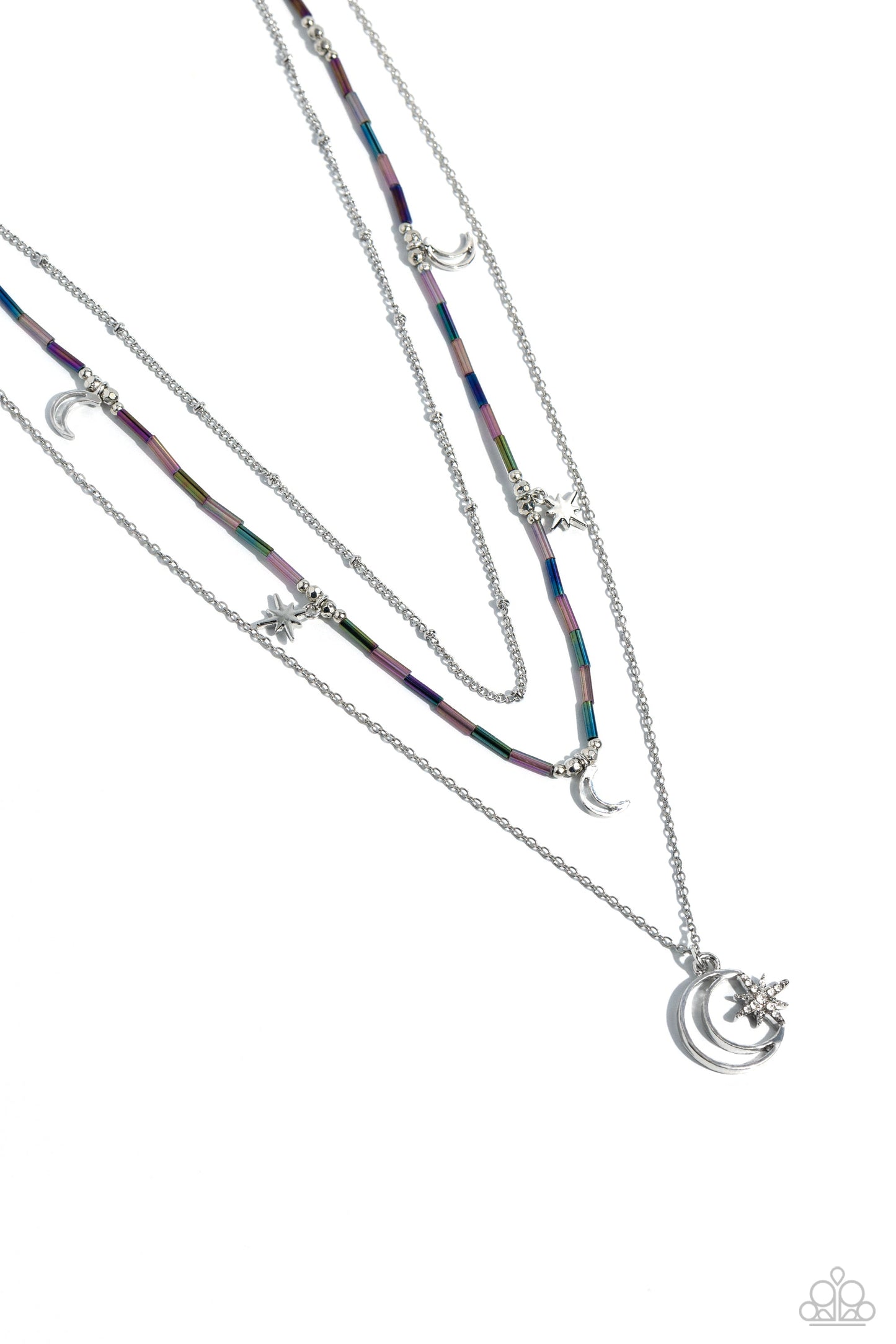 Constant as the Stars - Purple and Silver Necklace - Paparazzi Accessories - Three delicate chains across the chest, for a radiantly layered style. Purple and oil spill glass beads, a cosmic collection of silver stars and crescent moon charms dot the uppermost chain. The centermost chain is accented with dainty silver studs, an oversized silver crescent moon embellished with a sparkling three-dimensional silver star creates a heavenly pendant at the bottom of the longest chain in a radiant finish.
