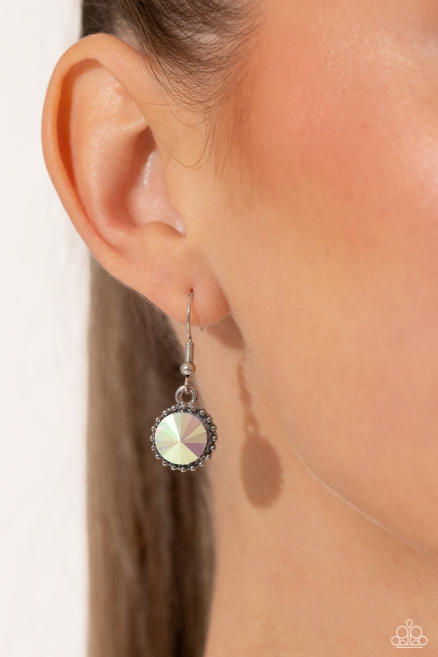 Dripping in Dazzle - Multi Iridescent Necklace - Paparazzi Accessories - An explosion of round, teardrop, and marquise-cut gems in varying sizes bordered by tactile silver studs cluster together to create a glittery iridescent showcase down the neckline. Featuring various shades of iridescence, each gem reflects light off of its faceted surface emitting further glitz and glam.