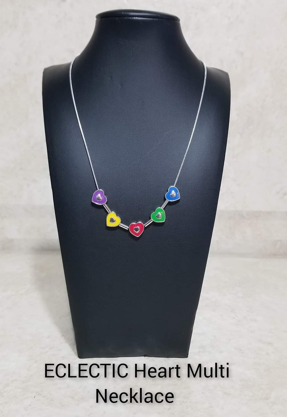 ECLECTIC Heart - Multi Color Necklace - Paparazzi Accessories - Strung along a dainty silver chain, a collection of silver heart frames, and silver bars alternate for a dainty display around the collar. Each heart is painted in a French Blue, Classic Green, red, High Visibility, and purple hue with dainty silver hearts glistening at their centers for a pop of colorful detail.