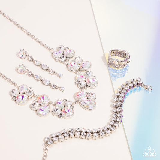 Fiercely 5th Avenue - Iridescent Jewelry Set - Paparazzi Accessories - Includes one of each accessory featured in the Fiercely 5th Avenue Trend Blend in April's Fashion Fix: Fairytale Frost - White Necklace, Fairytale Falls - White Post Earrings, Once Upon A TIARA - White Bracelet, and Her Royal Highness White Ring.