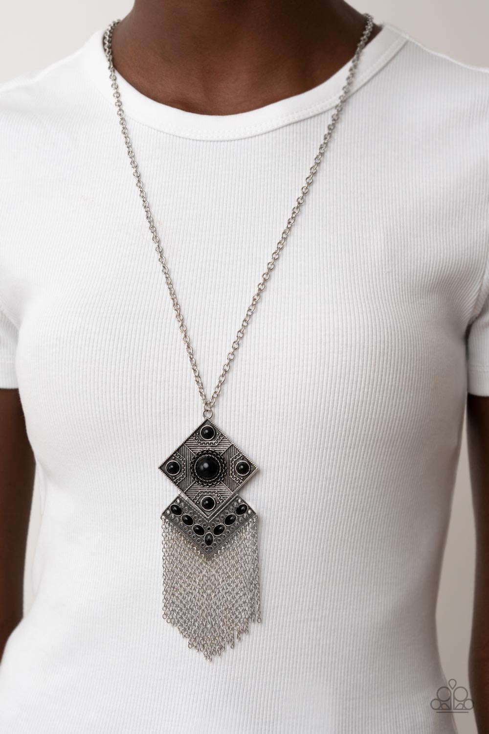 Kite Flight - Black and Silver Necklace - Paparazzi Accessories - A curtain of silver chains stream out from the bottom of stacked silver frames embellished in bubbly black beads and antiqued silver textures, resulting in a whimsical kite shaped pendant at the bottom of an extended silver chain.