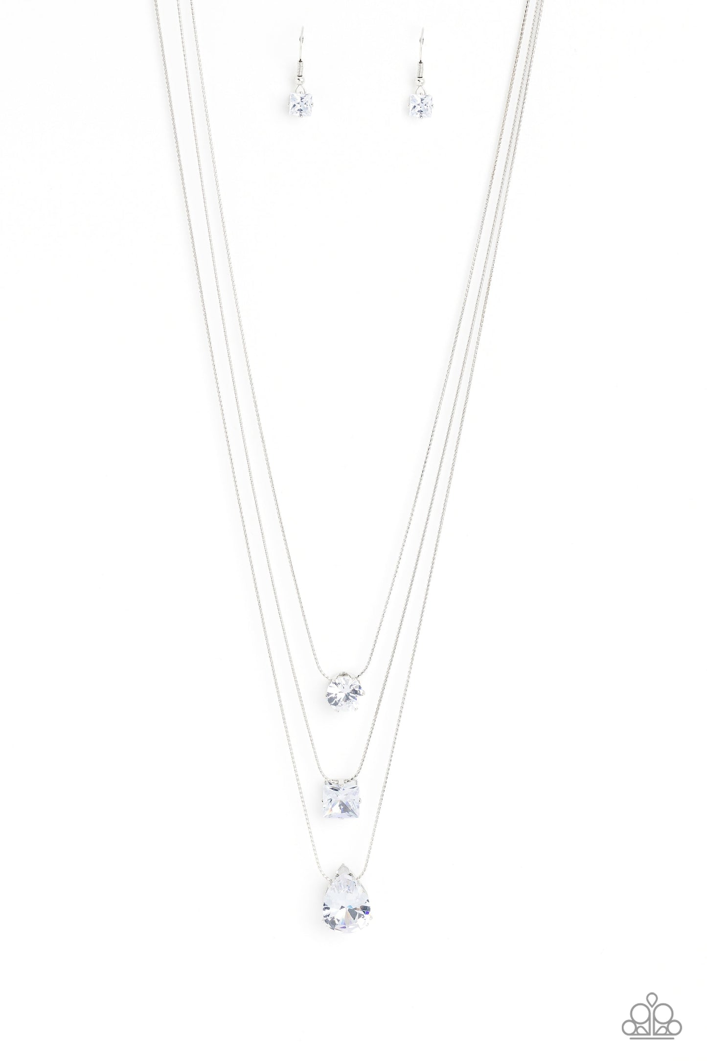 Lustrous Layers - White and Silver Necklace - Paparazzi Accessories - Featuring a subtle iridescent finish, exaggerated, faceted round, square, and teardrop gems layer down the chest from three sleek silver dainty chains, in a refined fashion.