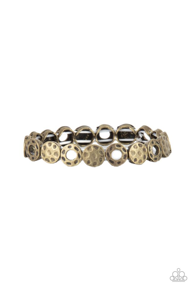 Metro Metalsmith - Brass Bracelet - Paparazzi Accessories - A rustically hammered collection of brass rings and discs are threaded along stretchy bands around the wrist, creating a dainty metallic centerpiece.