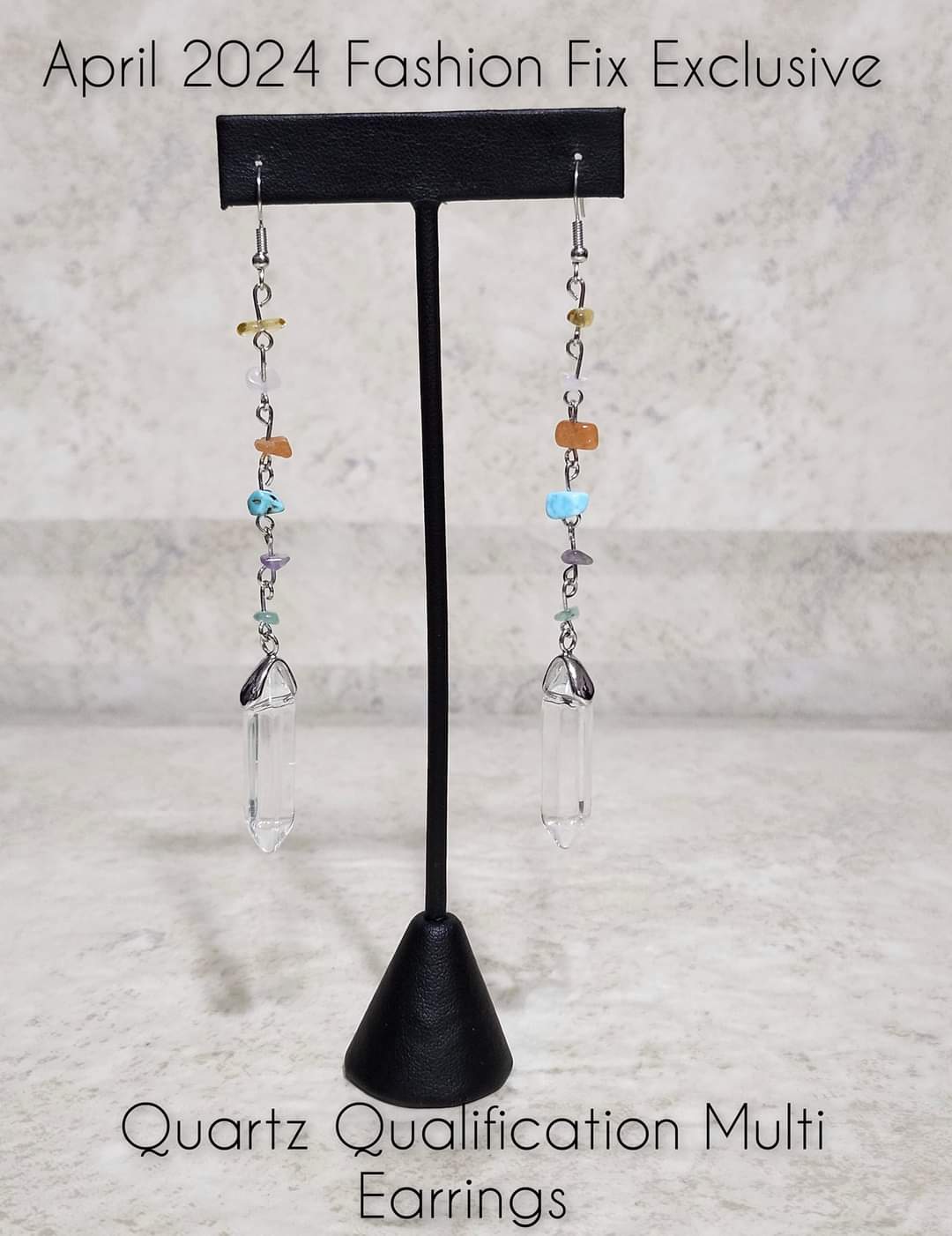 Quartz Qualification Multi Color Earrings - Paparazzi Accessories - Chiseled multicolored stones connect down the ear along a silver chain, leading the eye to a clear quartz-like piece at its end for an elegantly earthy lure. Earring attaches to a standard fishhook fitting.