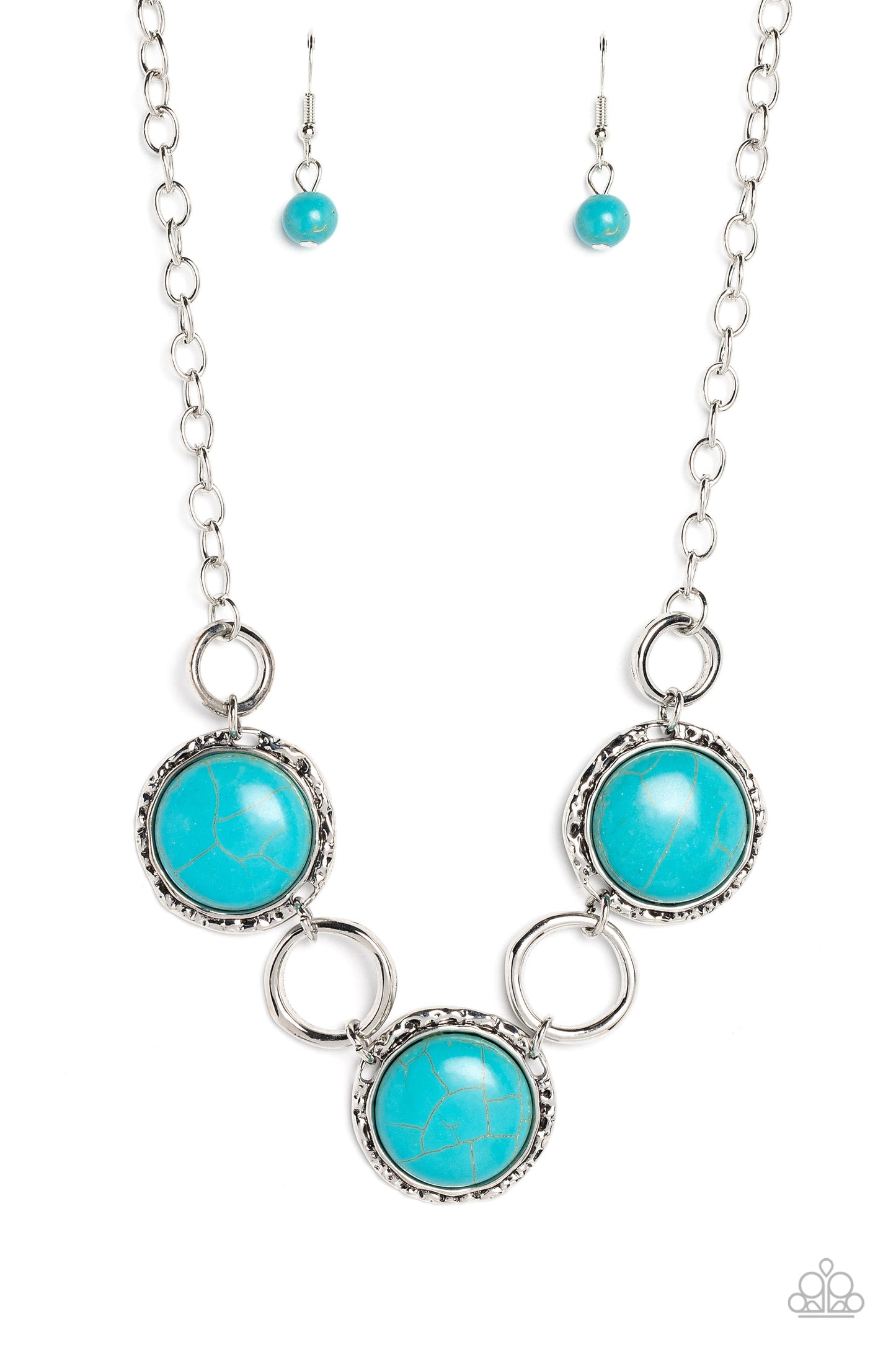 Saharan Scope - Blue Turquoise and Silver Necklace - Paparazzi Accessories - Warped silver hoops in varying sizes alternate along hammered silver frames. Pressed into the hammered frames, oversized turquoise stones add a vibrant, earthy flair to the summery palette. Features an adjustable clasp closure.