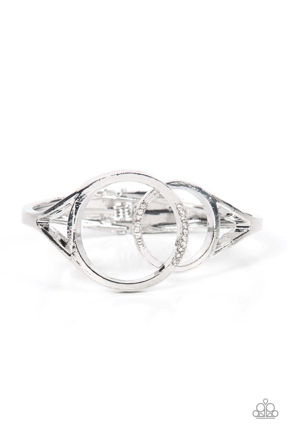 Scope of Expertise - White and Silver Bracelet - Paparazzi Accessories - Encrusted in sections of glassy white rhinestones, two oversized silver rings delicately overlap across the center of the wrist, resulting in a timeless bangle-like bracelet around the wrist. Features a hinged closure. Sold as one individual bracelet.