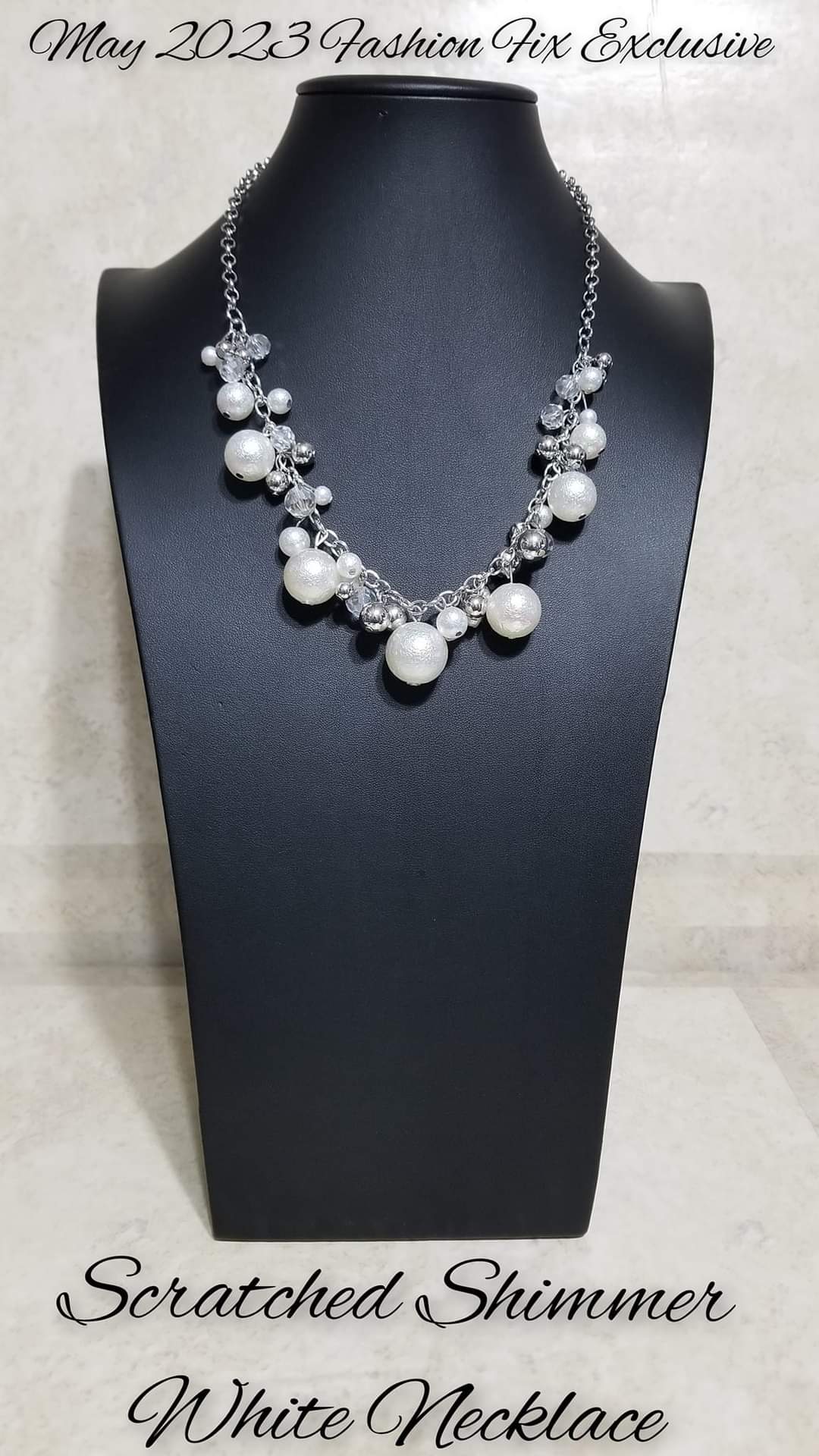 Scratched Shimmer - White and Silver Necklace - Paparazzi Accessories - Featuring glassy and polished finishes, pristine white and silver beads cascade from the bottom of a classic silver chain, creating a gorgeous clustered fringe below the collar. Varying sizes of iridescent beads, featuring a subtle scratch surface, add a refined shimmer to the clustered display for a gorgeous effect.