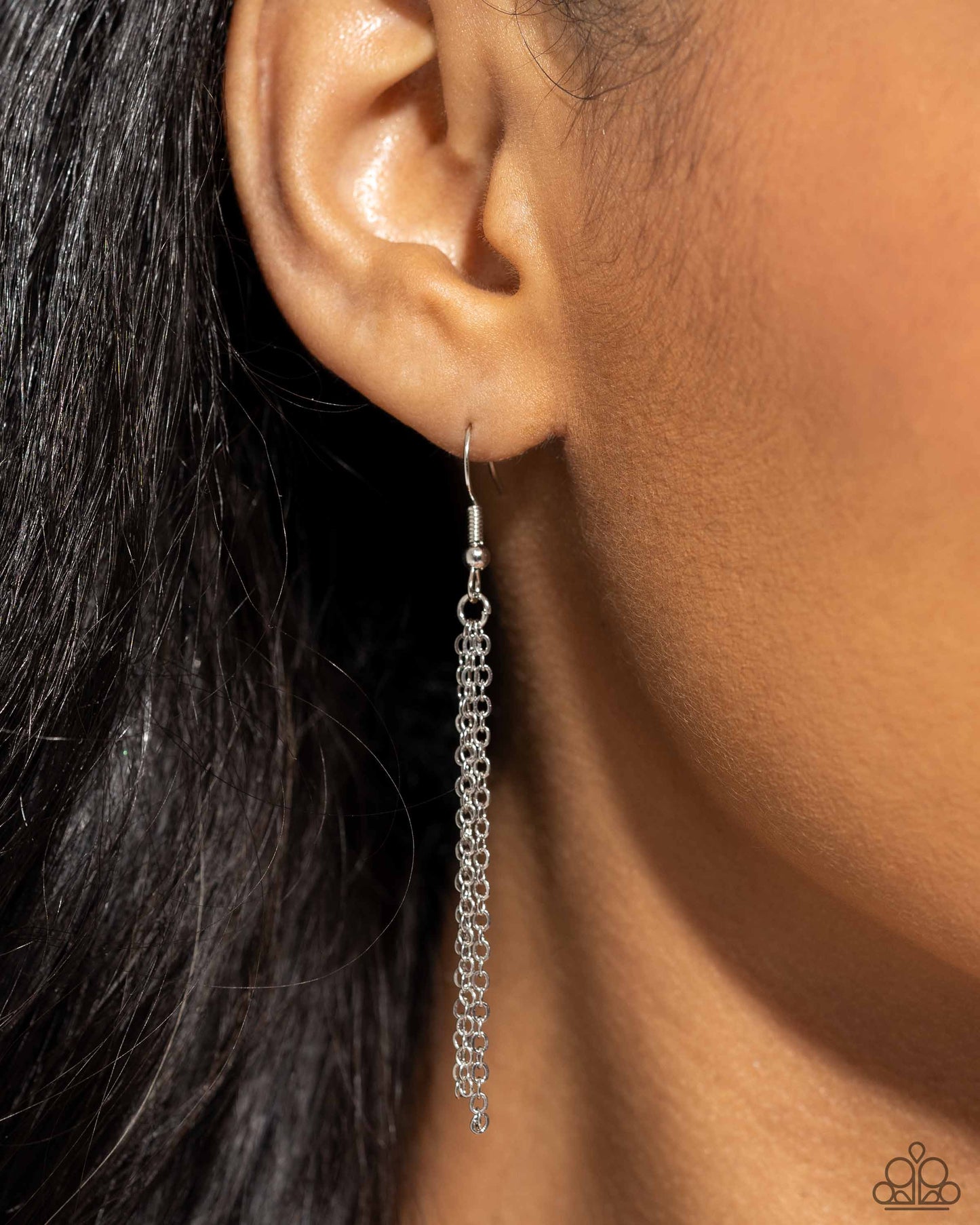 Seashell Sonata - Silver Necklace - Paparazzi Accessories - A mismatched collection of dainty silver and satellite silver chains loop and layer below the neckline. Dangling along each layer, textured silver seashells and a starfish create a coastal centerpiece.
