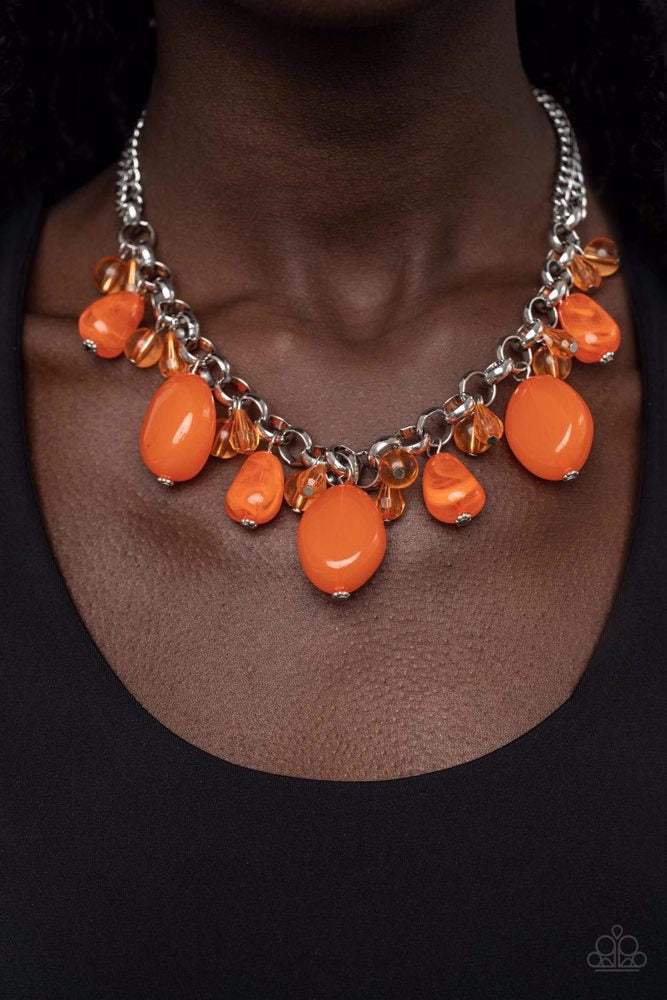 Venetian Vacation Orange Necklace - Paparazzi Accessories - Glassy orange beads and teardrop accents join an oversized assortment of orange faux stone beads dancing below the collar, resulting in a flirtatious fringe.