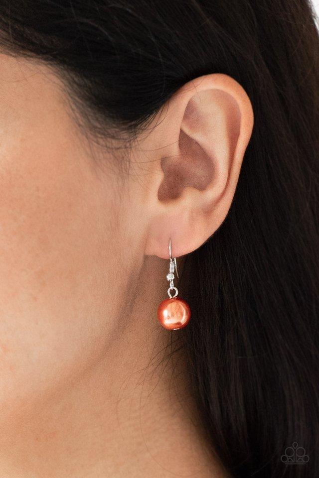 All About Me - Orange Pearl and Silver Necklace - Paparazzi Accessories -
Oversized orange pearls, ornate silver beads, and an array of glistening silver accents trickle along a lengthened silver chain for a refined look. Features an adjustable clasp closure.