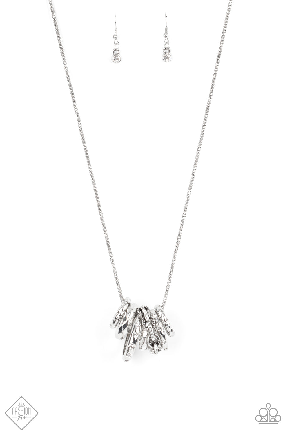 Audacious Attitude - Silver Necklace - Paparazzi Accessories - Featuring white rhinestones, faceted surfaces, twisted finishes, and chain-like patterns, an edgy collection of mismatched silver rings glide along a lengthened silver popcorn chain in a glamorously gritty finish. Features an adjustable clasp closure. Sold as one individual necklace.