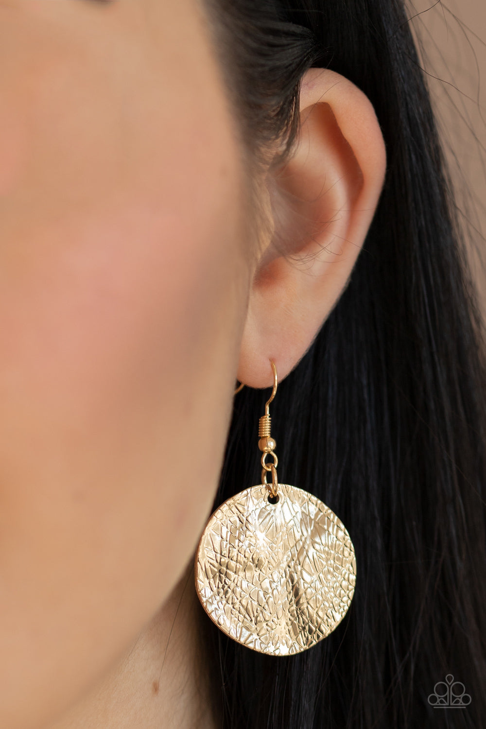 Barely Scratched The Surface - Gold Fashion Necklace - Paparazzi Accessories - Scratched in shimmer, warped gold discs swing from the bottom of a thick gold chain, creating a bold fringe below the collar. Features an adjustable clasp closure. Sold as one individual necklace. Includes one pair of matching earrings.