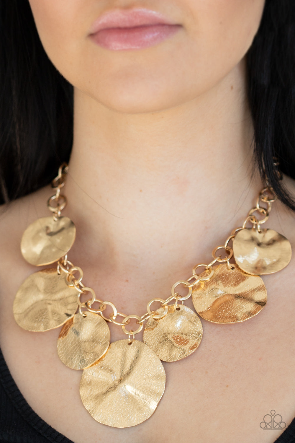 Barely Scratched The Surface - Gold Fashion Necklace - Paparazzi Accessories - Scratched in shimmer, warped gold discs swing from the bottom of a thick gold chain, creating a bold fringe below the collar. Features an adjustable clasp closure. Sold as one individual necklace.