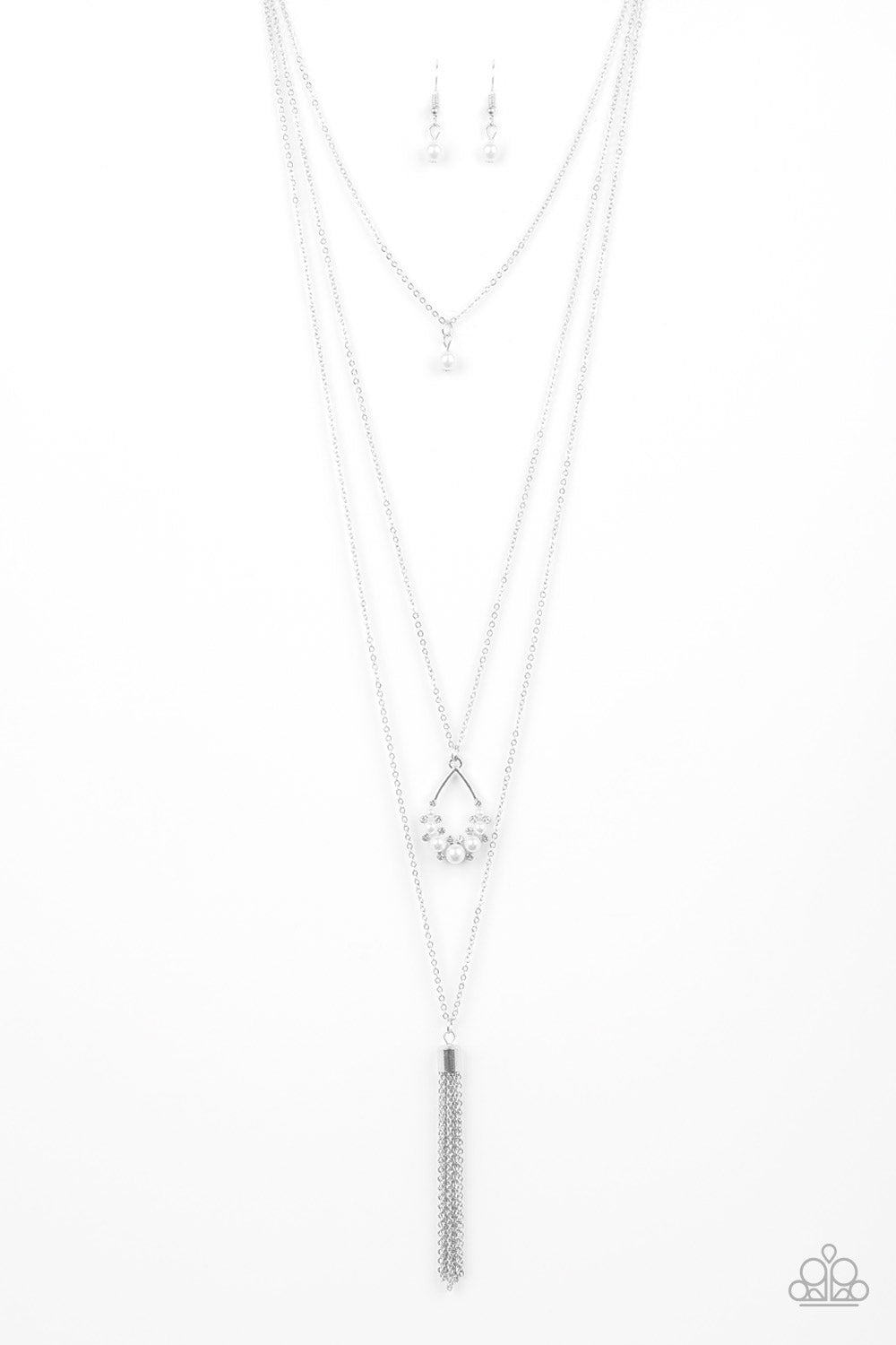 Be Fancy - White Pearl and Silver Necklace - Paparazzi Jewelry - Bejeweled Accessories By Kristie - A solitaire white pearl swings from the uppermost chain, giving way to a teardrop pendant and shimmery silver chain tassel. Dainty white rhinestones and white pearls collect at the bottom of the centermost pendant for a glamorous finish. Features an adjustable clasp closure. Sold as one individual necklace.