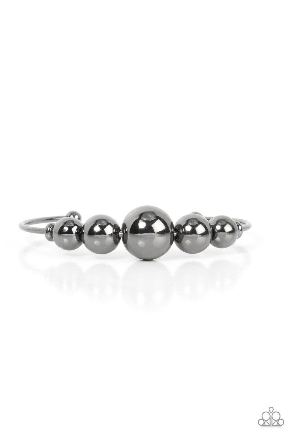 Bead Creed - Black Gunmetal Bracelet - Paparazzi Accessories - Gradually increasing in size, an oversized collection of gunmetal beads are threaded along a dainty gunmetal cuff for a dramatic industrial display. Sold as one individual bracelet.