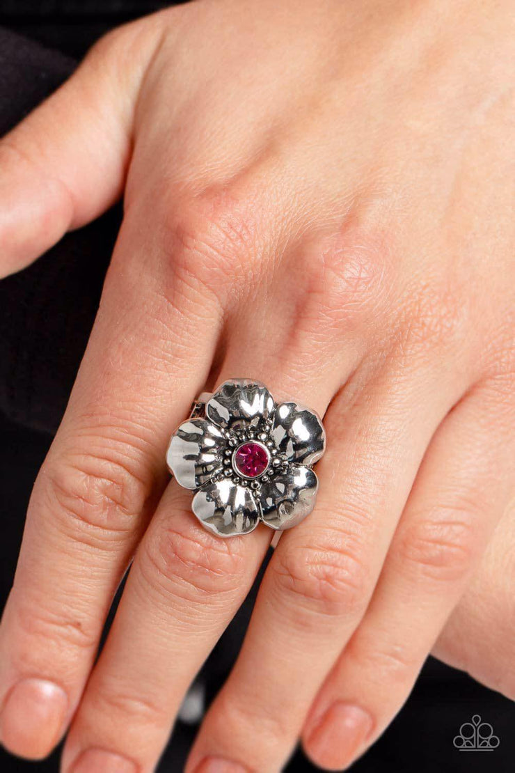 Bloom Bloom Pow - Pink Floral - Silver Ring - Paparazzi Accessories - Dotted with dainty silver studs and a dainty fuchsia rhinestone center, folds of shiny silver curl into an oversized tropical flower for a whimsical dash of island inspiration atop the finger.