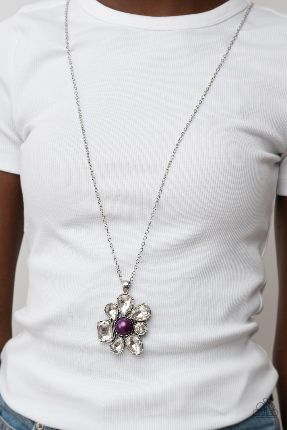 BLOOM Shaka-Laka - Purple Pearl - Silver Floral Necklace - Paparazzi Accessories - Encased in pronged silver fittings, a mismatched collection of oversized teardrop, round, and emerald cut rhinestones asymmetrically blooms from a bubbly purple pearl drop center for a surprisingly sparkly floral pendant at the bottom of a silver chain.