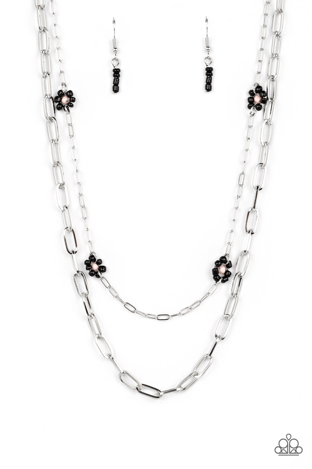 Bold Buds - Black and Silver Flower Necklace - Paparazzi Accessories - Elongated silver ovals link together to create an industrially edgy sheen below the collar. A slightly daintier version of the same style of chain layers above, dotted with black seed bead flowers with pink centers that add playful pops of color along the way. Features an adjustable clasp closure.
