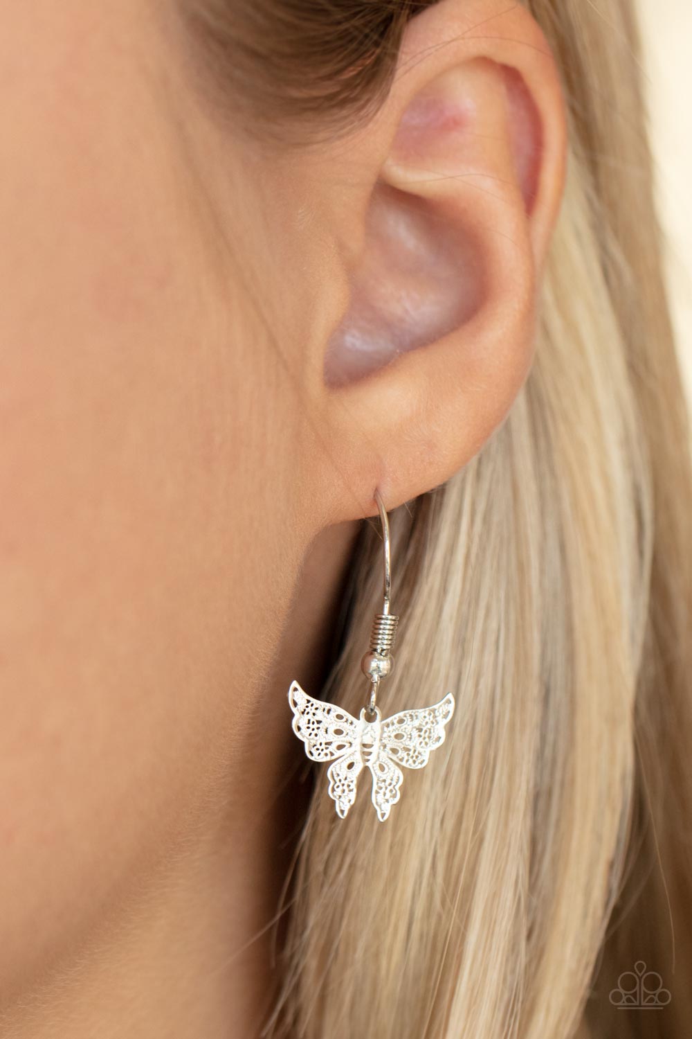 Bountiful Butterflies - Silver Necklace - Paparazzi Accessories - Dotted with a dainty white rhinestone, a decoratively layered silver butterfly swings from the bottom of a display of mismatched silver chains for a whimsically fluttering fashion. Features an adjustable clasp closure - Bejeweled Accessories By Kristie - Trendy fashion jewelry for everyone -