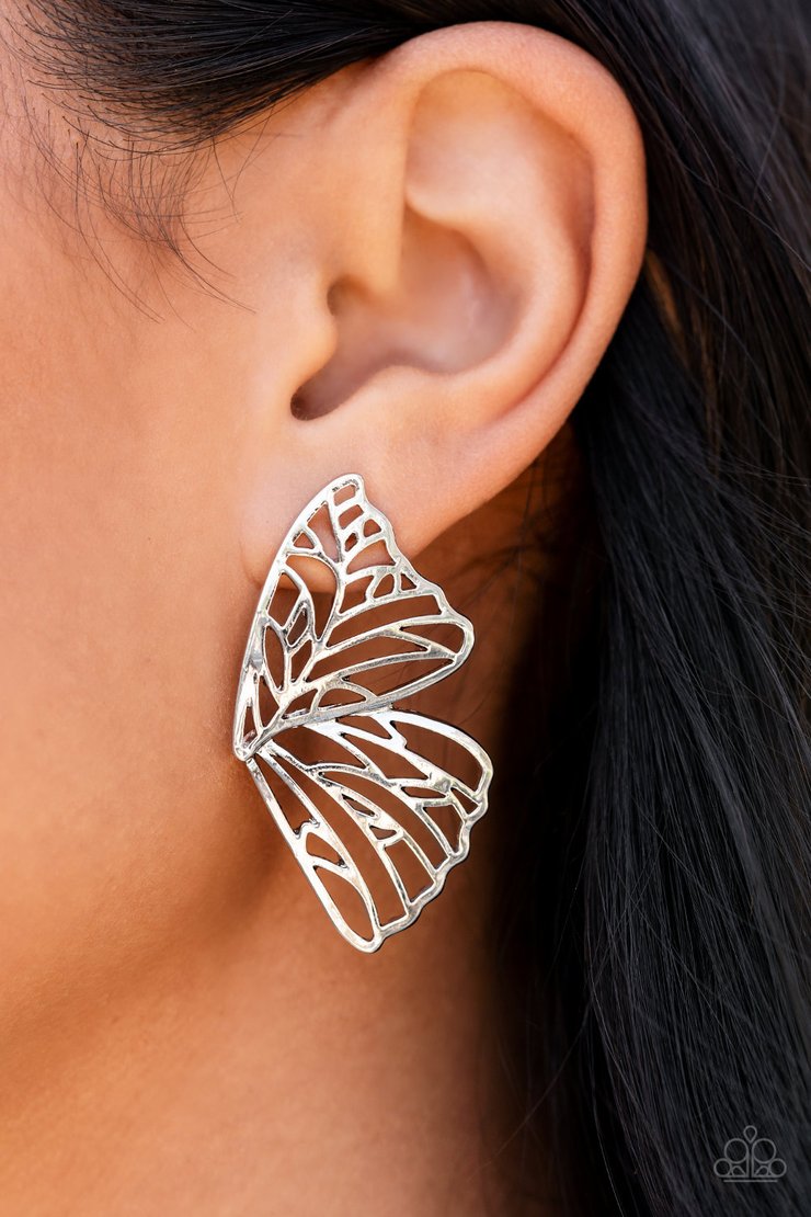 Butterfly Frills - Silver Earrings - Paparazzi Accessories -
Shimmery silver bars delicately climb scalloped silver frames, coalescing into a whimsical butterfly wing. Earring attaches to a standard post fitting.
Sold as one pair of double-sided post earrings.