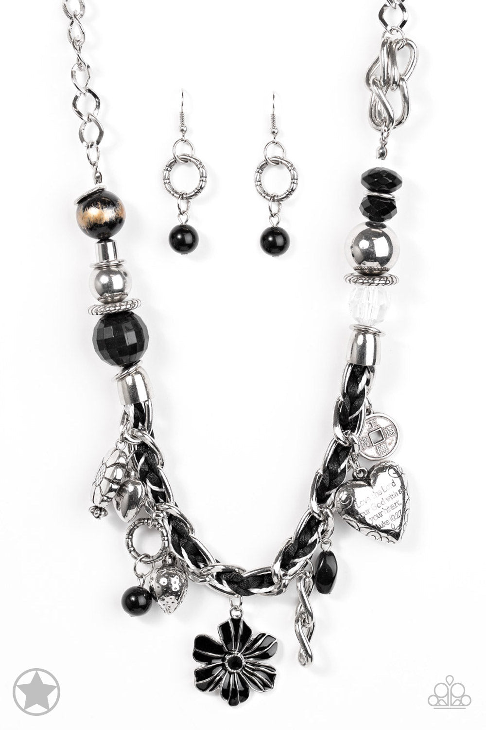 Charmed, I Am Sure - Black and Silver Necklace - Paparazzi Accessories - Black and ivory cording is braided through a chunky silver chain. A unique variety of charms decorate the piece including a delicate flower and a heart. Heart is inscribed with the phrase "With All My Heart"on one side and a short bible verse on the other that reads, "Love the Lord thy God with all your heart. Luke 10:27." Features an adjustable clasp closure. Bejeweled Accessories By Kristie