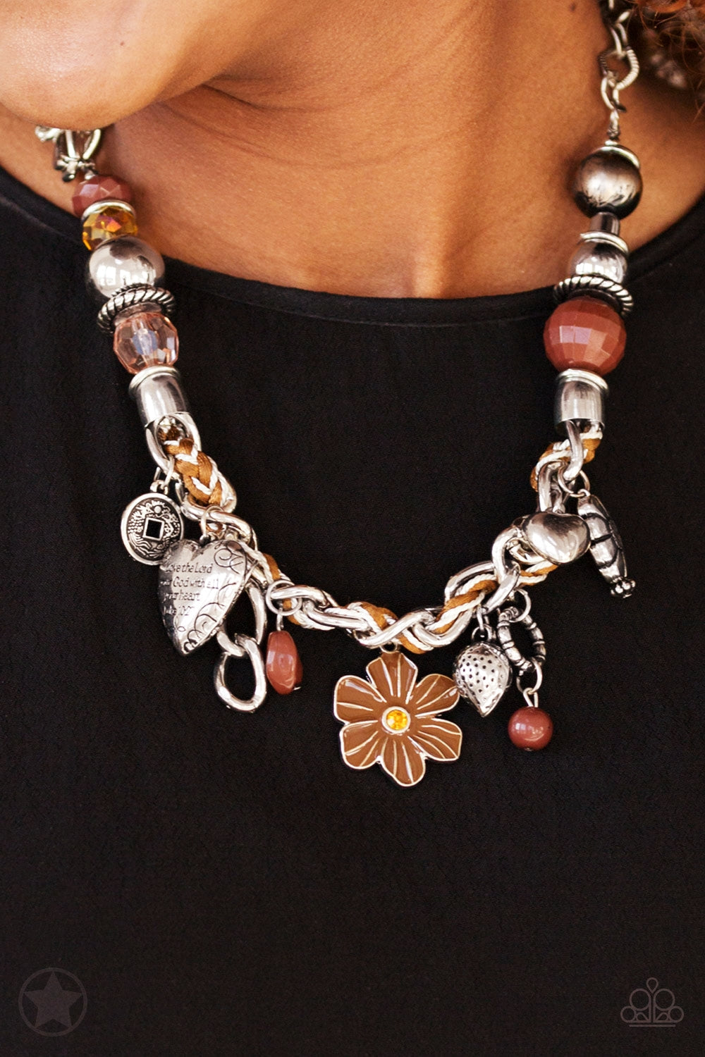 Charmed, I Am Sure - Brown and Silver Necklace - Paparazzi Accessories - Brown and ivory cording is braided through a chunky silver chain. A unique variety of charms decorate the piece including a delicate flower and a heart inscribed with the phrase "With All My Heart" on one side and a short bible verse on the other that reads, "Love the Lord thy God with all your heart. Luke 10:27" Features an adjustable clasp closure.