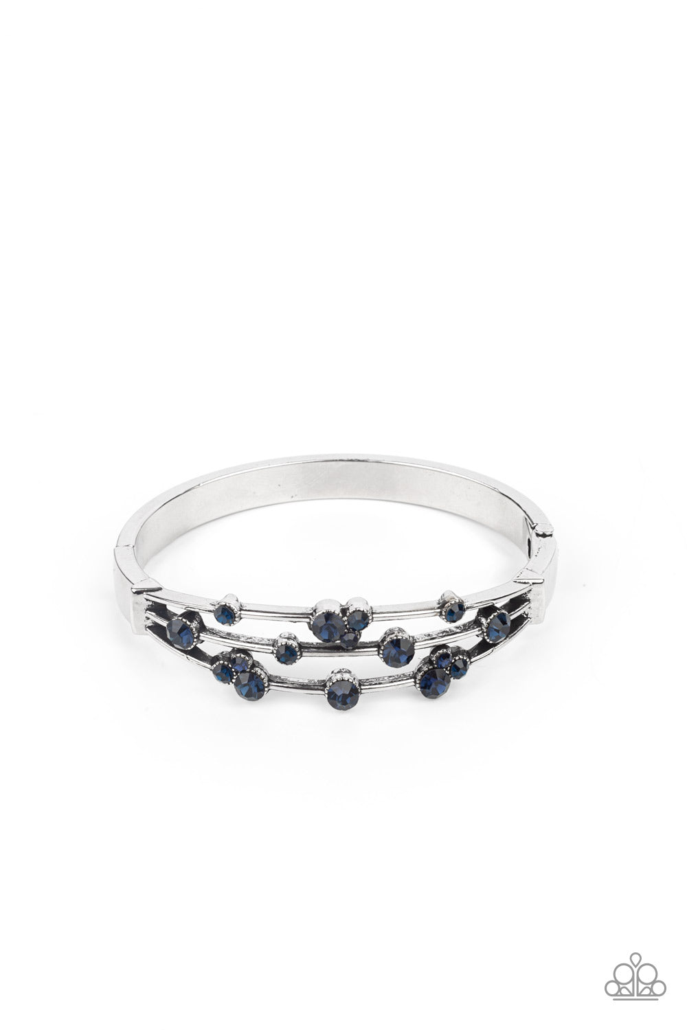 Cosmic Candescence - Blue Rhinestone - Silver - Hinged Closure Bracelet - Paparazzi Accessories -
A smattering of glittery blue rhinestones adorn three silver bars that coalesce into a versatile silver cuff-like bangle around the wrist. Features a hinged closure.
Sold as one individual bracelet.