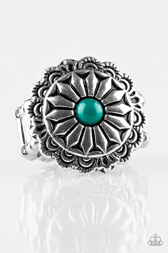 Daringly Daisy - Floral Green and Silver Ring - Paparazzi Accessories - A refreshing green bead is pressed into a glistening silver frame radiating into a floral detail for a seasonal look. Features a stretchy band for a flexible fit. Sold as one individual ring. Bejeweled Accessories By Kristie - Trendy fashion jewelry for everyone -