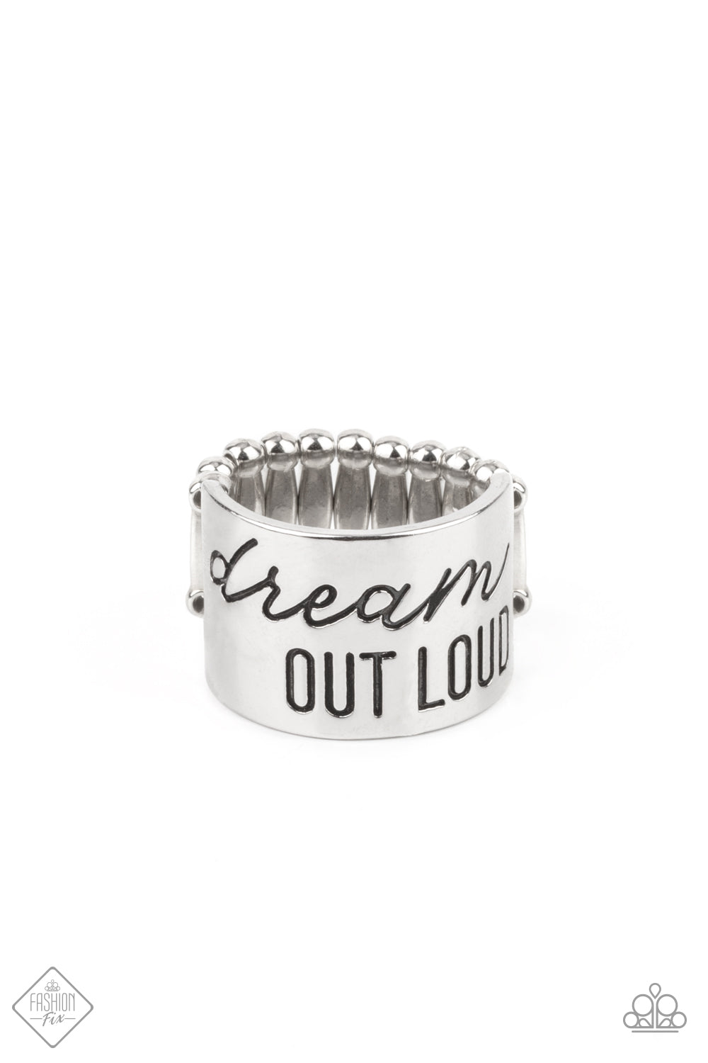 Dream Louder - Dream Out Loud - Silver Ring - Paparazzi Accessories -
The front of a thick silver band is stamped in the phrase, "Dream out loud," creating an inspirational centerpiece across the finger. Features a stretchy band for a flexible fit.
Sold as one individual ring.