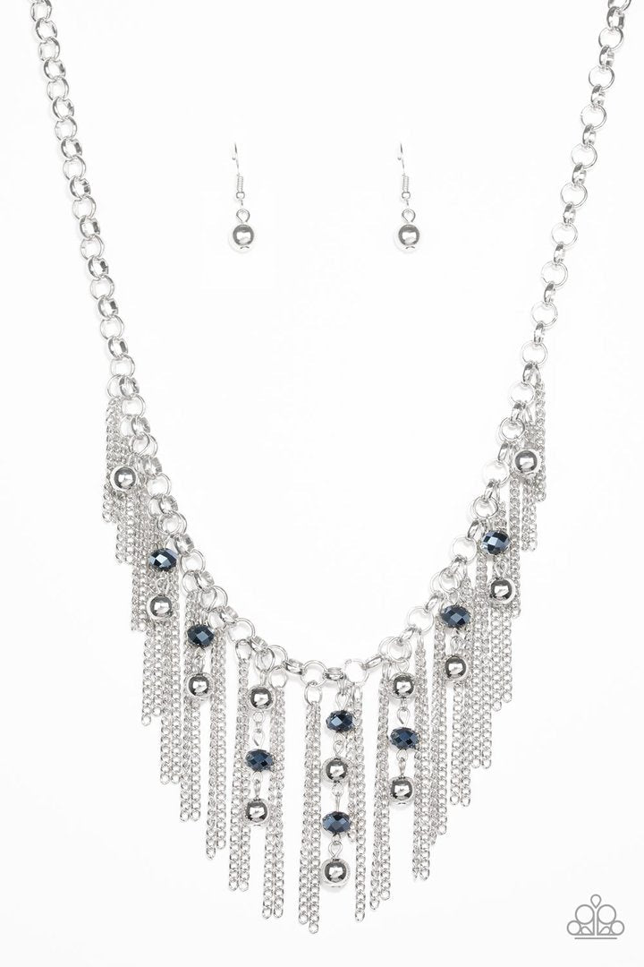 Ever Rebellious - Blue and Silver Necklace - Paparazzi Accessories - Glistening silver chains and strands of metallic blue crystal-like beads and glistening silver beads stream from the bottom of a bold silver chain, creating a sassy fringe below the collar. Features an adjustable clasp closure. Sold as one individual necklace.