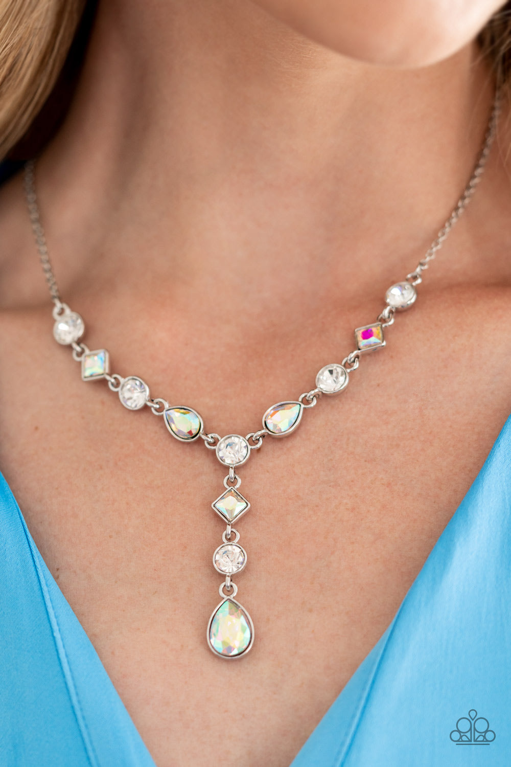Forget the Crown - Iridescent and Silver Necklace - Paparazzi Accessories - Brilliant white round-cut rhinestones alternate between diamonds and teardrops with an iridescent finish, creating an elegant lariat fit for royalty. Due to its prismatic palette, color may vary. Features an adjustable clasp closure. Sold as one individual necklace.