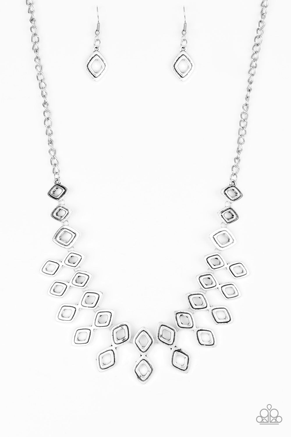 Geocentric - Silver Fashion Necklace - Paparazzi Accessories - Brushed in an antiqued shimmer, glistening diamond-shaped silver frames link below the collar, coalescing into an edgy geometric fringe. Features an adjustable clasp closure. Sold as one individual necklace.