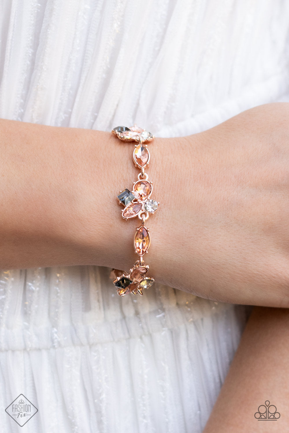 Glimpses of Malibu - 4 Piece Rose Gold Trend Blend Jewelry Set - Paparazzi Accessories - Includes one of each accessory in the Glimpses of Malibu Trend Blend in April's Fashion Fix: Completely Captivated Necklace, Attractive Allure Earrings, Colorful Captivation Bracelet, Law of Attraction Fashion Ring. Featuring playful styles accented with fun pops of color, the Glimpses of Malibu Collection is an endearing assortment of cheerful and whimsical laid-back fashion.