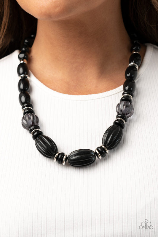 High Alert - Black Bead Necklace - Paparazzi Accessories - Varying in size and shape, a hearty collection of glassy, hammered, and polished black beads are threaded along an invisible wire below the collar. Dainty silver beads and discs are sprinkled along the colorful collaboration for a shimmery finish. Features an adjustable clasp closure. Sold as one individual necklace.