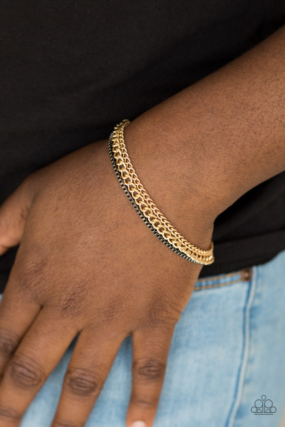 Industrial Icon - Gold and Gunmetal Bracelet - Paparazzi Accessories - Dainty gunmetal box chain and mismatched gold chains layer across the wrist, creating a collision of industrial textures. Features an adjustable clasp closure. Sold as one individual fashion bracelet.