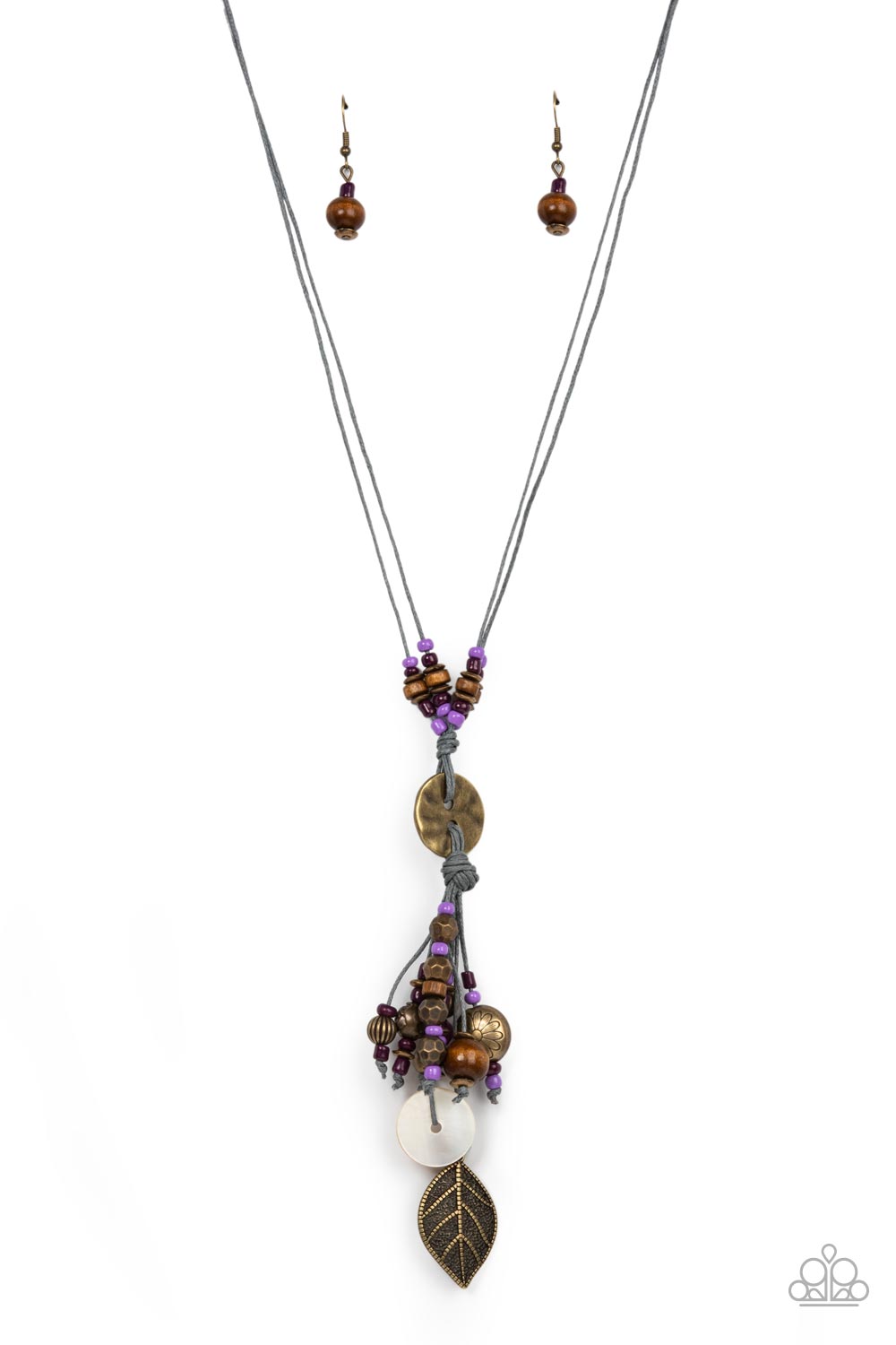 Knotted Keepsake - Purple Seed Bead - Brass Necklace - Paparazzi Accessories - An earthy assortment of purple and plum seed beads, rustic brass discs, and wooden accents glide along lengthy strands of gray cording that knot around a hammered brass disc. Tassels of matching beads, a white shell-like accent, floral silver bead, and brass leaf charm dance from the bottom, adding playful movement to the free-spirited display. Features an adjustable clasp closure. Sold as one individual necklace.
