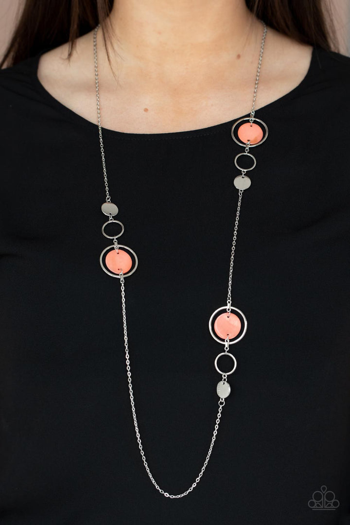Laguna Lounge - Coral Orange and Silver Necklace - Paparazzi Accessories - A shimmery collection of dainty silver discs, shiny silver rings, and Burnt Coral shell-like frames delicately link across the chest, creating a summery display. Features an adjustable clasp closure. Sold as one individual fashion necklace.