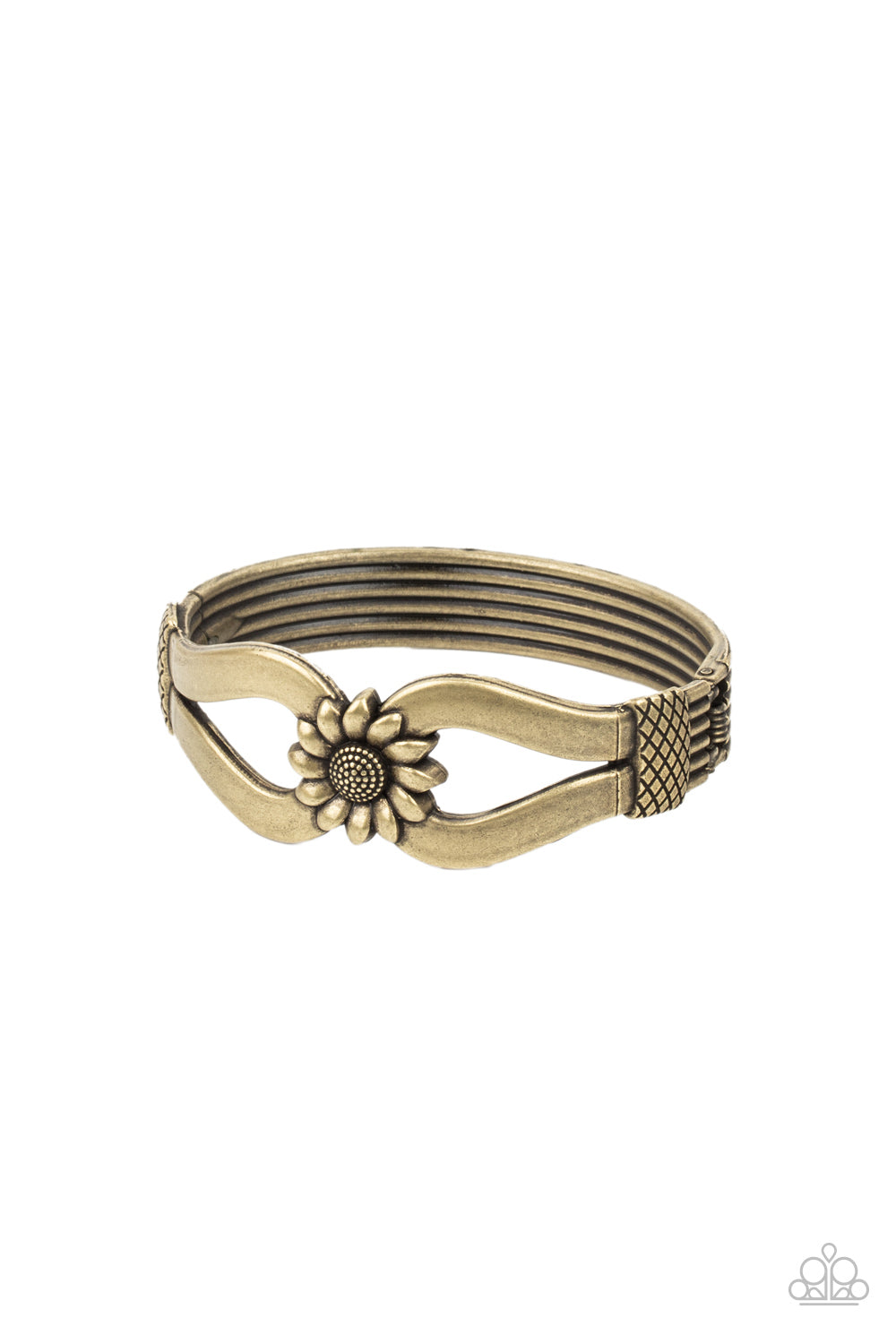 Let A Hundred SUNFLOWERS Bloom - Brass Cuff Hinged Bracelet - Paparazzi Accessories - Antiqued brass ribbons loop out from a decorative brass sunflower that attaches to a ribbed brass frame, creating a cuff-like bangle around the wrist. Features a hinged closure. Sold as one individual stylish fashion bracelet.