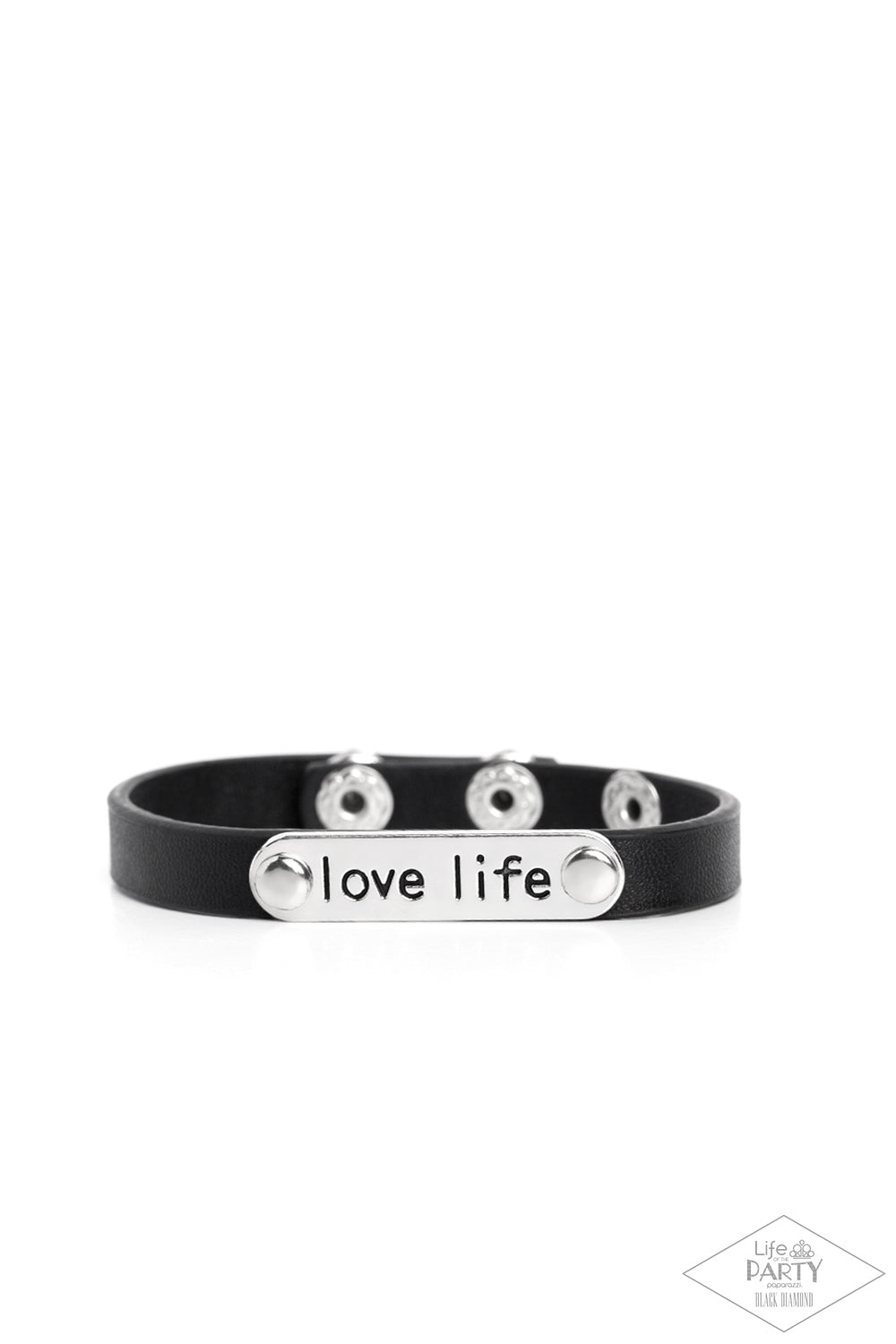Love Life - Black and Silver Bracelet - Paparazzi Accessories - A silver plate engraved with the inspirational phrase “love life” is studded in place along a skinny strip of black leather. Brushed in a shiny finish, the dainty band wraps around the wrist for a simple seasonal style.