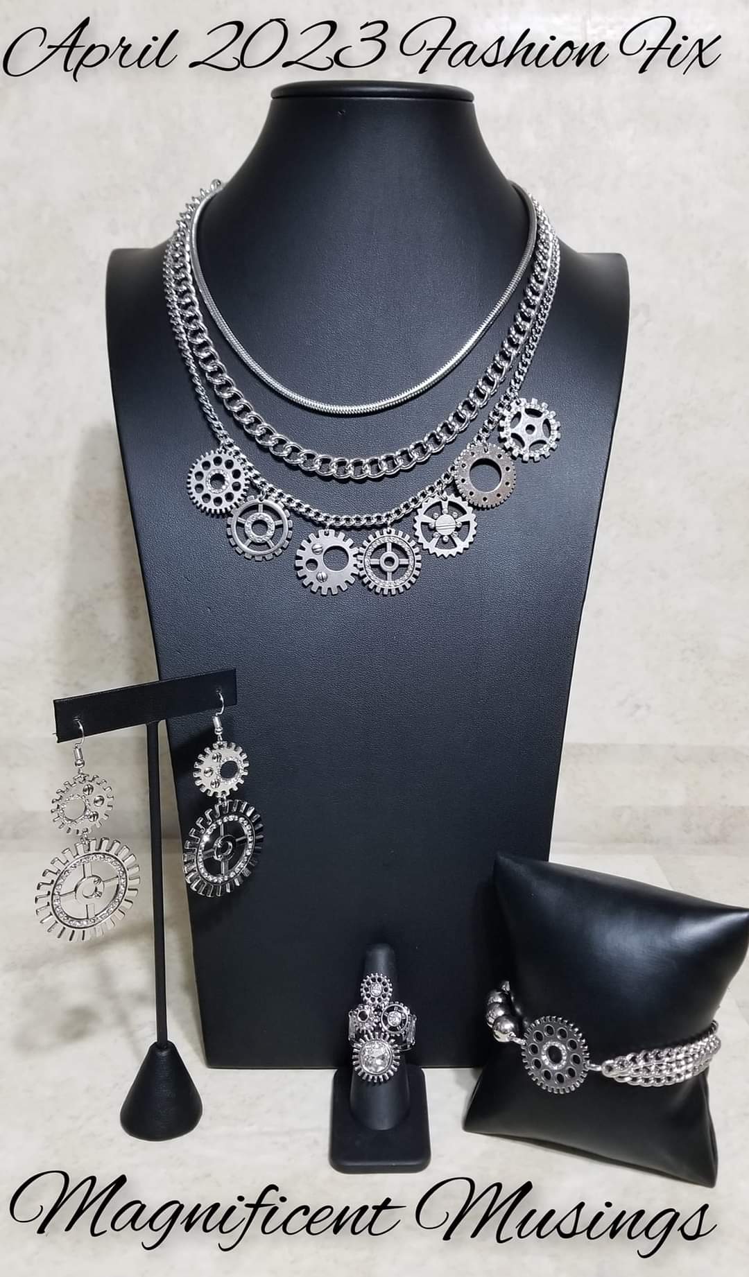 Magnificent Musings - Silver Jewelry Set - Paparazzi Accessories - Includes one of each accessory featured in the Magnificent Musings Trend Blend in April 2023 Fashion Fix: Running Out of STEAMPUNK Necklace, I Have a STEAMPUNK Earrings, Age of STEAMPUNK Bracelet, and Blowing Off STEAMPUNK Ring. This collection features bold statement pieces and edgy designs for a sassy, unapologetic fashion.