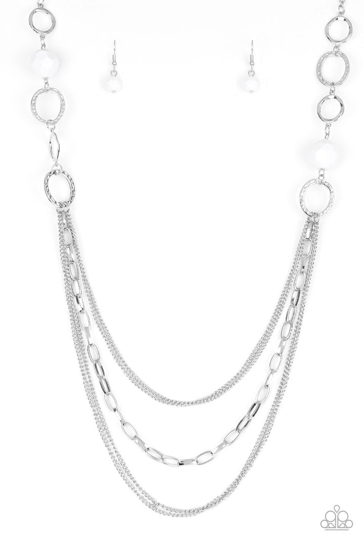 Margarita Masquerades - White and Silver Necklace - Paparazzi Accessories - Faceted white beads and hammered silver hoops give way to layers of mismatched silver chains for a whimsical look. Features an adjustable clasp closure. Sold as one individual necklace.