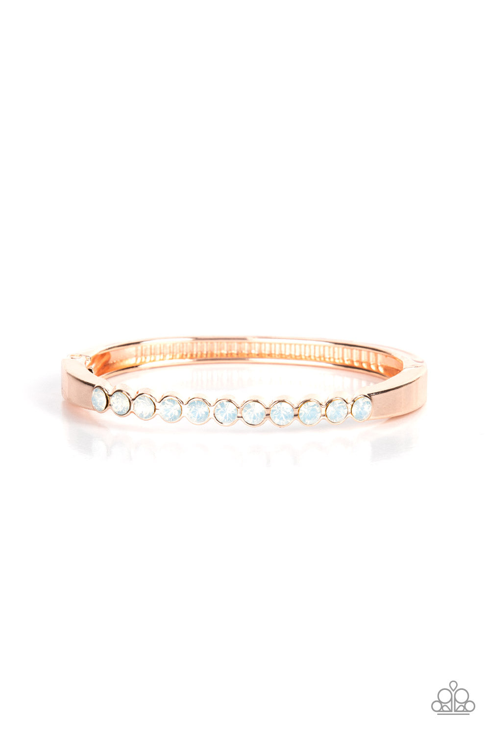 Mystical Masterpiece - Rose Gold Hinge Bracelet - Paparazzi Accessories - An opalescent row of white rhinestones hinges to a glistening rose gold bar that curves around the wrist, creating a sparkly cuff-like bracelet. Features a hinged closure.