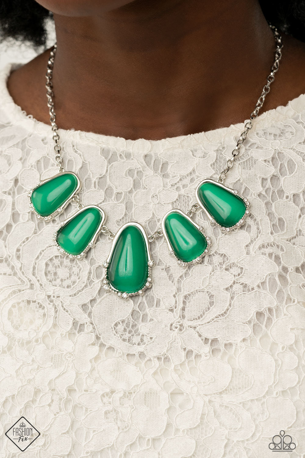 Newport Princess - Mint Green and Silver Fashion Necklace - Paparazzi Accessories - Mint cat’s eye stone teardrops are encased inside imperfect silver frames as they link below the collar. The dainty silver frames are dotted in dainty silver studs and glassy white rhinestones, for sparkle to this stylish necklace.