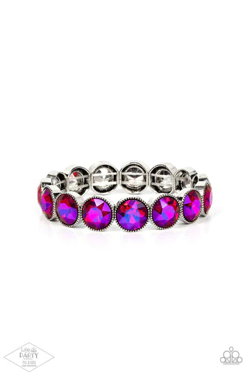 Number One Knockout - Pink Oil Spill Bracelet - Paparazzi Accessories - Featuring a flashy oil spill iridescence, faceted pink gems are pressed into sleek silver frames. The glittery frames are threaded along elastic stretchy bands, creating a glamorous look around the wrist.