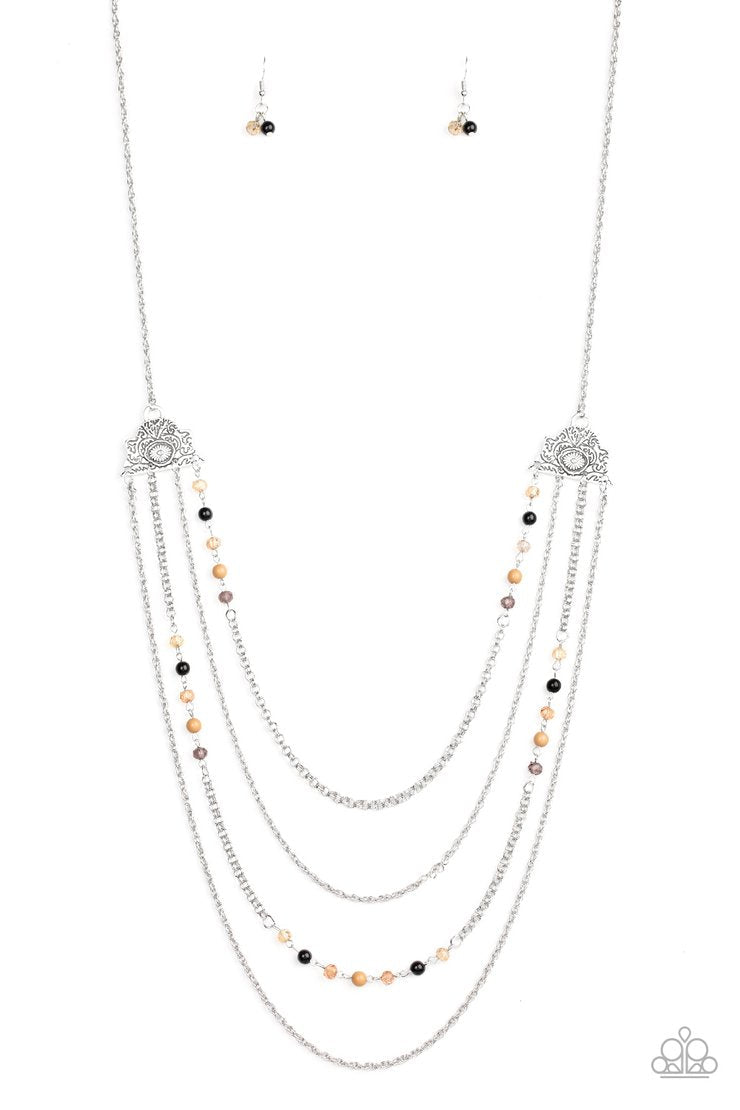 Pharaoh Finesse - Brown - Black - Silver Necklace - Paparazzi Accessories - Attached to two ornate floral silver fittings, shimmery silver chains and strands of polished brown, black, and glassy crystal-like beads cascade across the chest with a layered look.