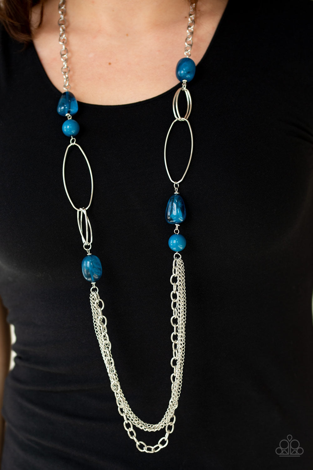 Pleasant Promenade - Blue and Silver Necklace - Paparazzi Accessories - Polished and cloudy faux rock finishes, blue beads link with bold silver hoops. The whimsical compilation gives way to layers of mismatched silver chains for a seasonal finish.