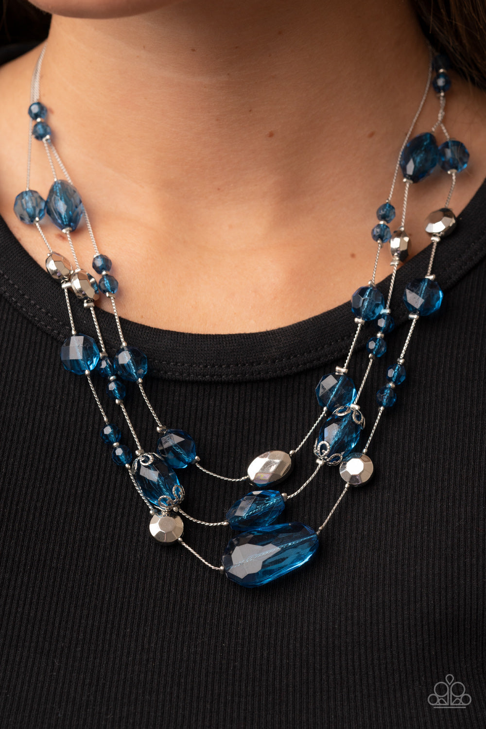 Prismatic Pose - Mykonos Blue and Silver Necklace - Paparazzi Accessories - Variety of faceted silver beads and Mykonos Blue crystal-like accents are fitted in place along layers of silver wire-like chain, resulting in a prismatic pop of color. Features an adjustable clasp closure fashion necklace.